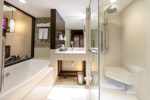 Separate bathtub and shower, rainfall showerhead, free toiletries