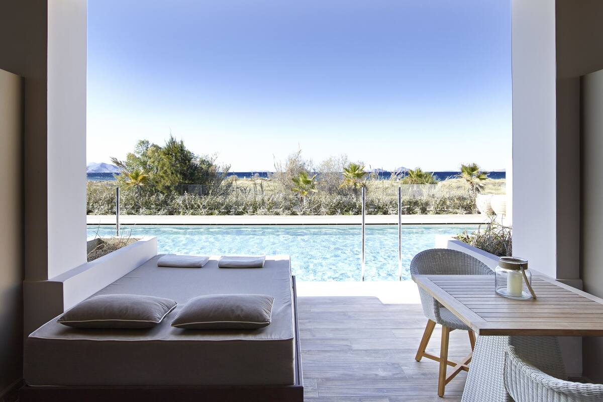 Junior Suite, Pool Access | Balcony view