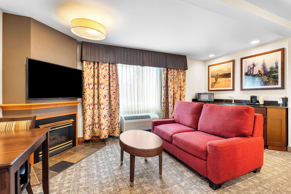 desk, blackout curtains, iron/ironing board, free cots/infant beds