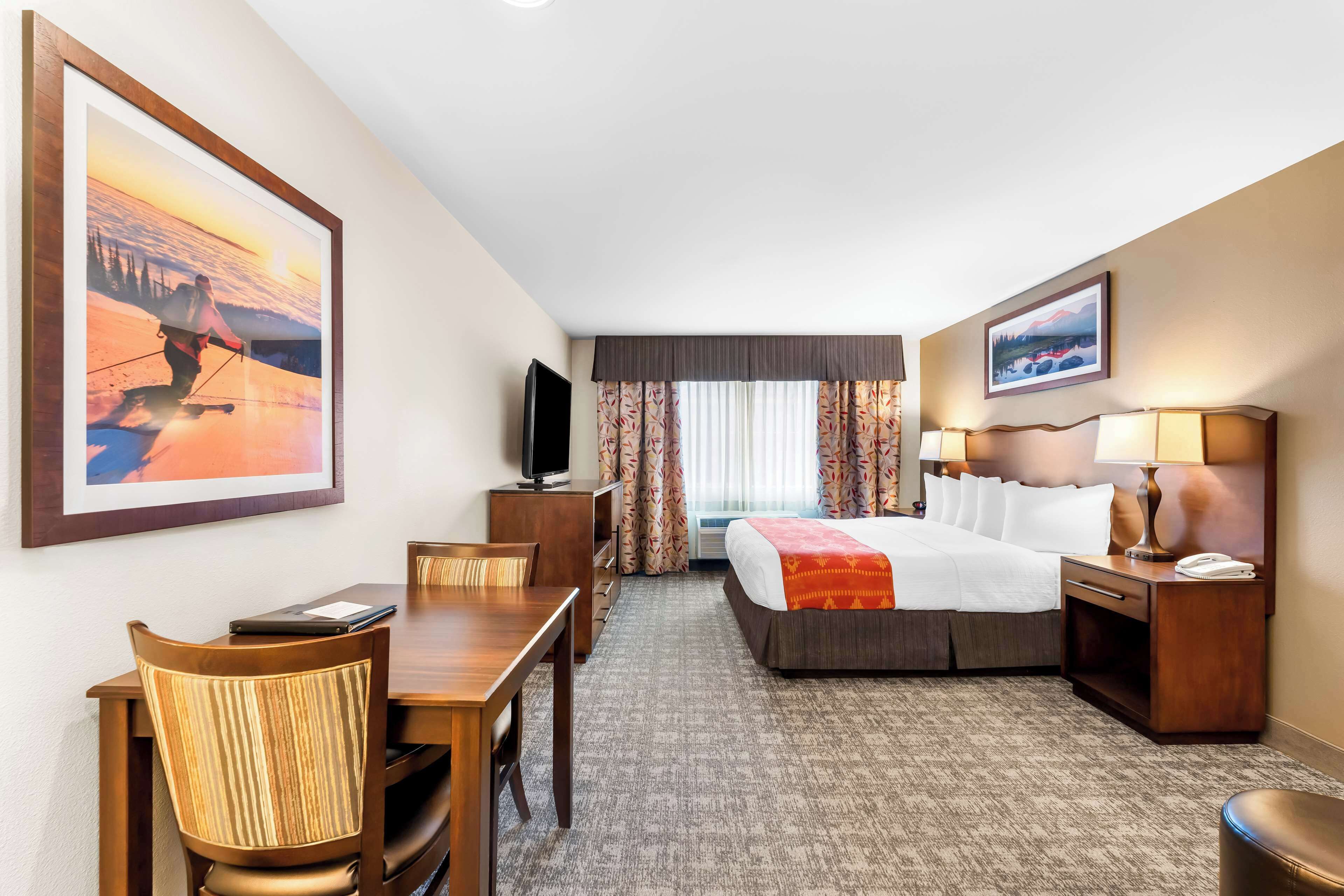 desk, blackout curtains, iron/ironing board, free cots/infant beds