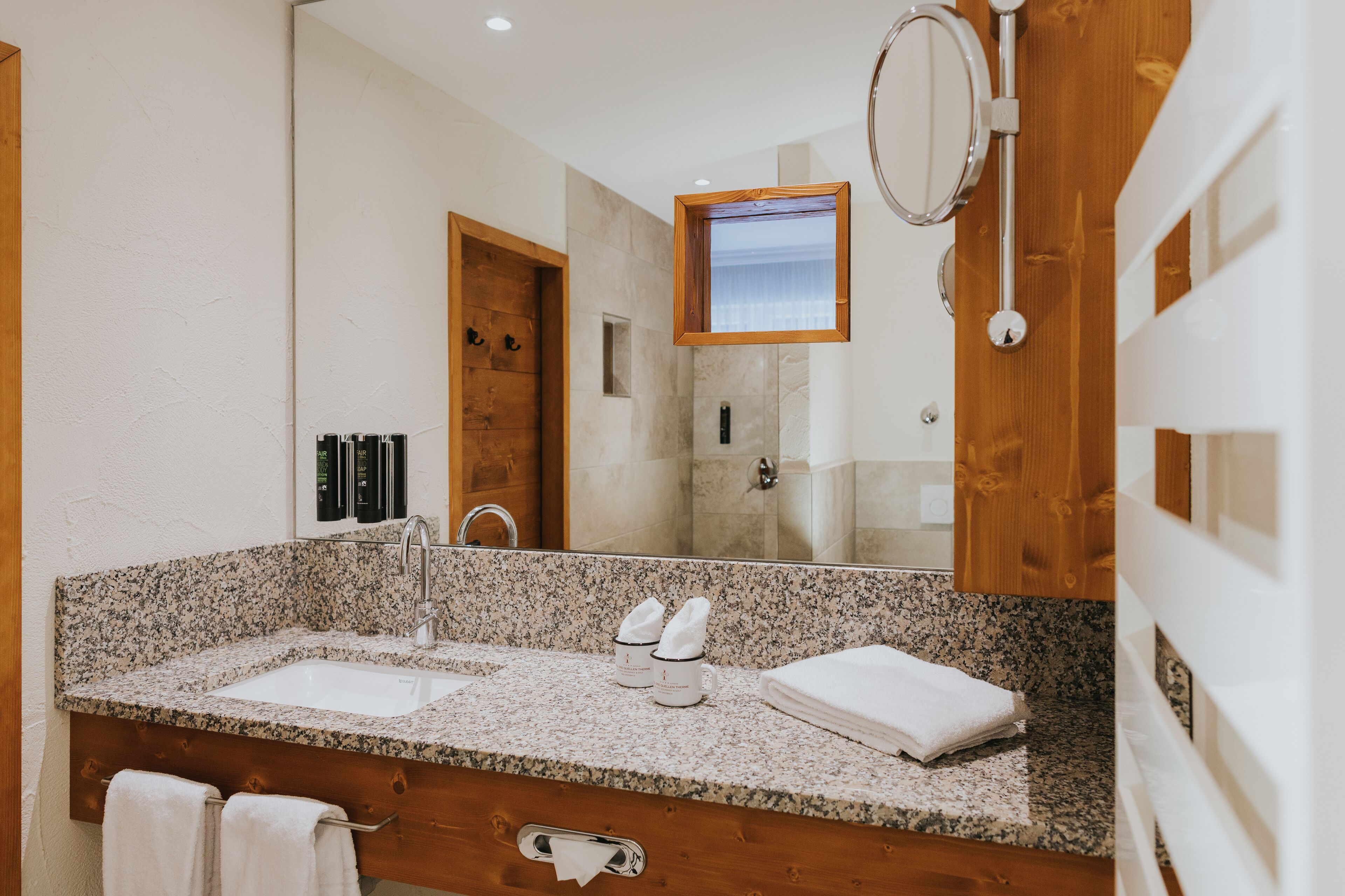 shower, hair dryer, bathrobes, slippers