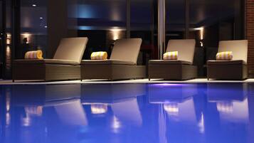 Indoor pool, open 7:30 AM to 10:00 PM, pool loungers