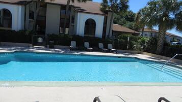 Outdoor pool, pool umbrellas, sun loungers