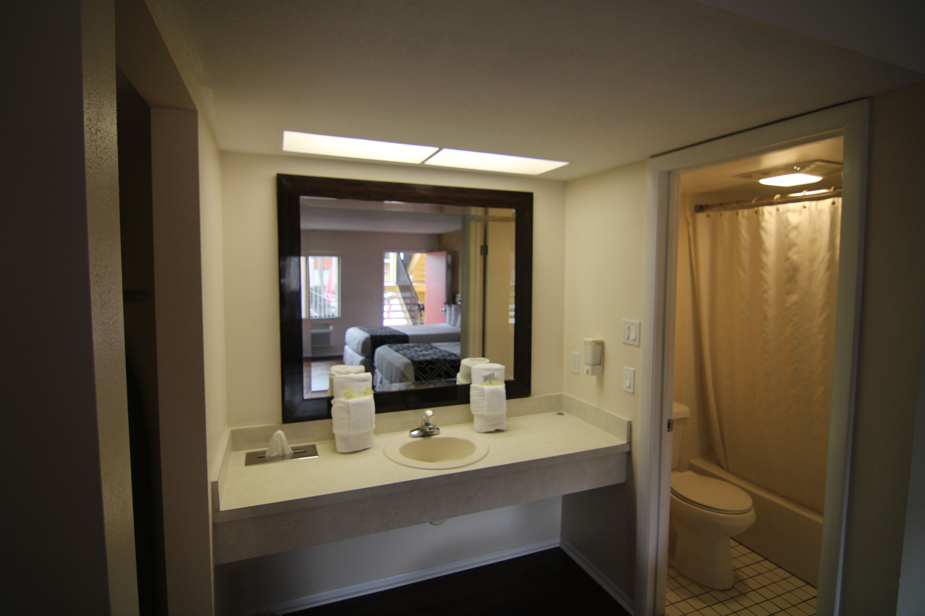 Classic Double Room, 2 Queen Beds | Bathroom | Free toiletries, hair dryer, soap, shampoo
