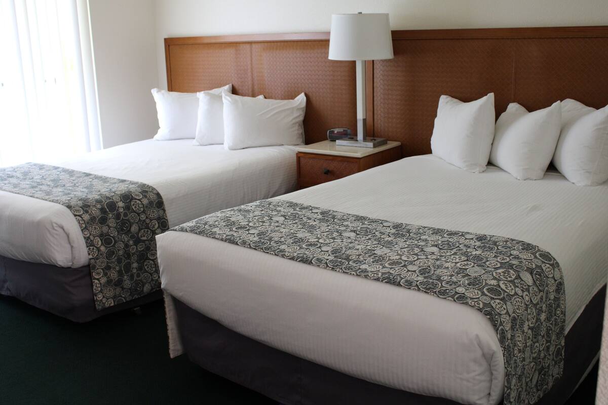 Standard Room, 2 Double Beds | Desk, soundproofing, iron/ironing board (on request), WiFi (free)