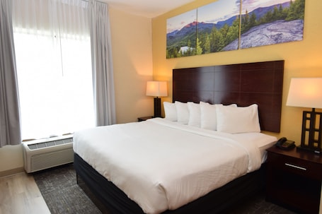 Deluxe Suite | Premium bedding, pillowtop beds, desk, laptop workspace