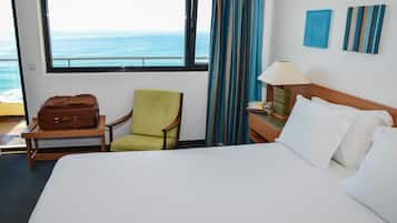 Twin Room, Sea View | Minibar, in-room safe, desk, soundproofing