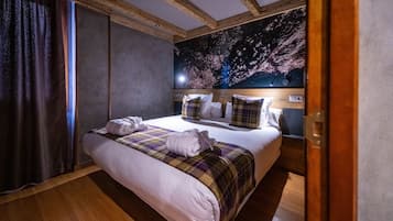 Donzen dekbedden, een minibar, een kluis op de kamer