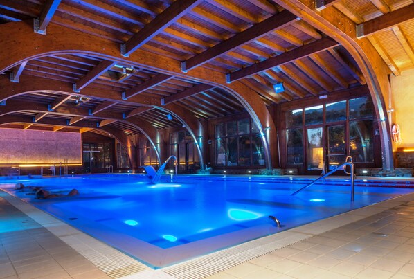 Indoor pool, seasonal outdoor pool, pool loungers