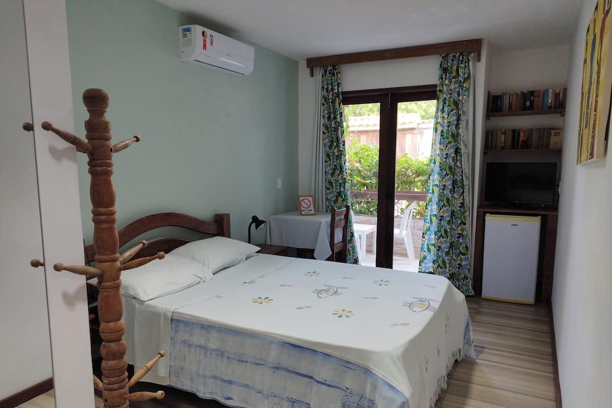 Standard Double Room | Minibar, in-room safe, desk, blackout curtains