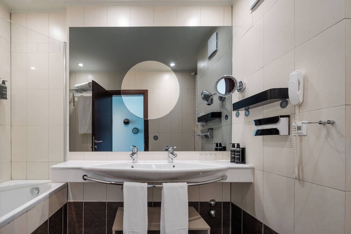 Eco-friendly toiletries, hair dryer, bathrobes, towels