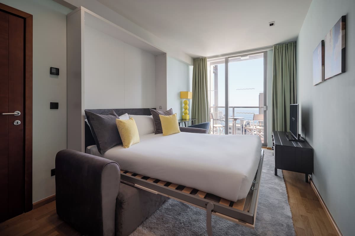 30-inch flat-screen TV with cable channels, TV