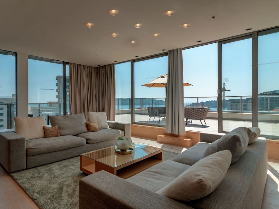 Premium Suite | Living area | 30-inch flat-screen TV with cable channels, TV