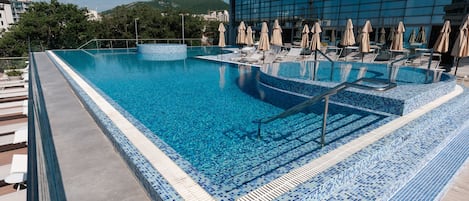 Indoor pool, 2 outdoor pools, pool umbrellas, sun loungers