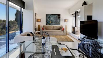 Deluxe Villa, 1 Bedroom (Town House) | Living room | LCD TV