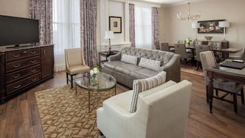 Presidential, One King Bed | Living area | 42-inch flat-screen TV with satellite channels, TV, video-game console