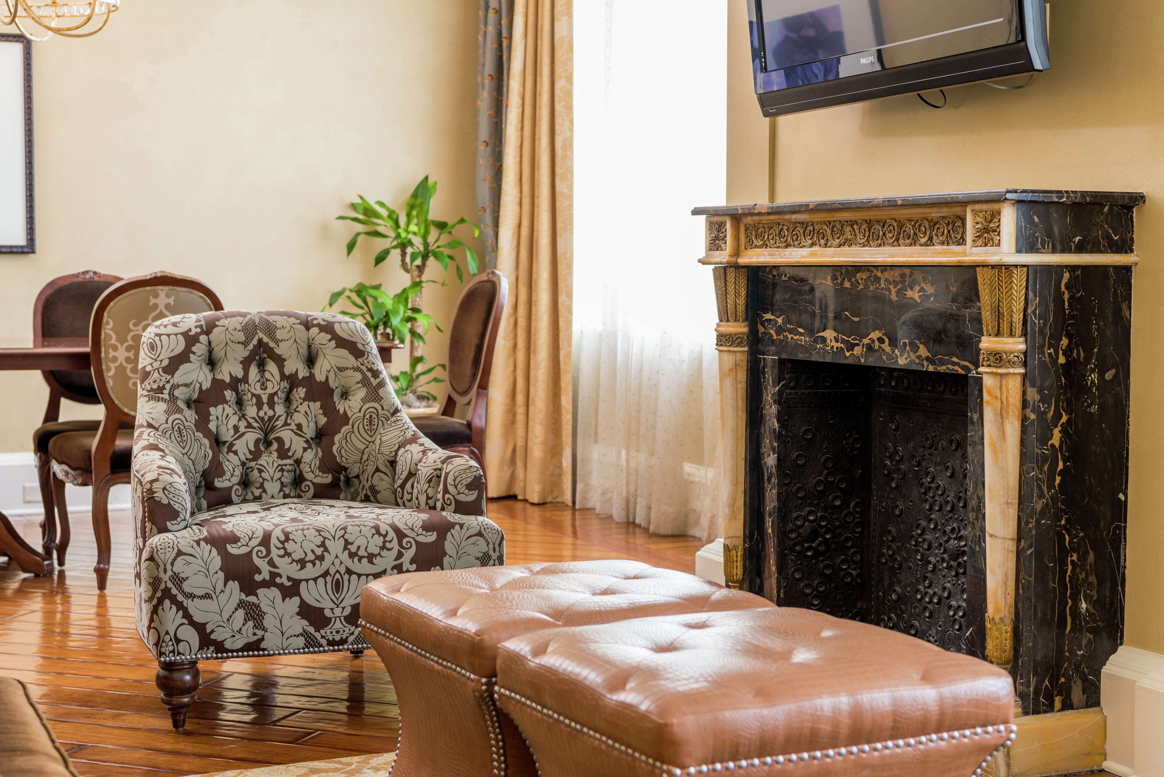 presidential, one king bed | living area | 42-inch flat-screen tv with satellite channels, tv, video game console