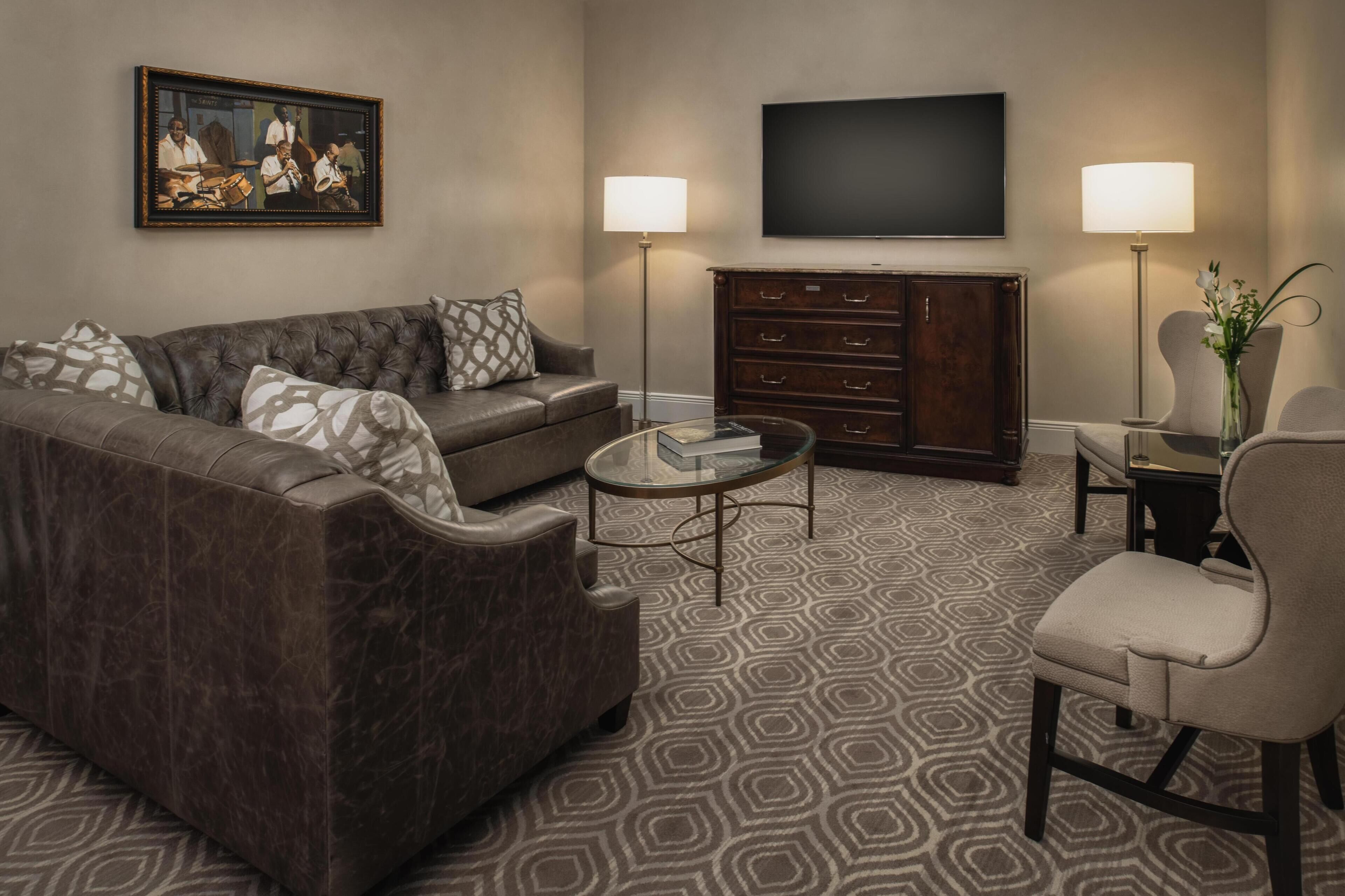 Suite, One King Bed | Living area | 42-inch flat-screen TV with satellite channels, TV, video game console