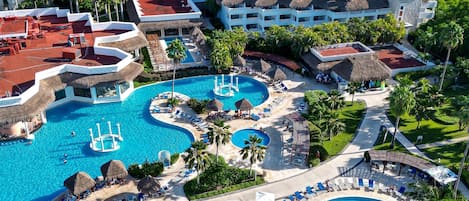 Indoor pool, 12 outdoor pools, open 8:00 AM to 8:00 PM, free cabanas