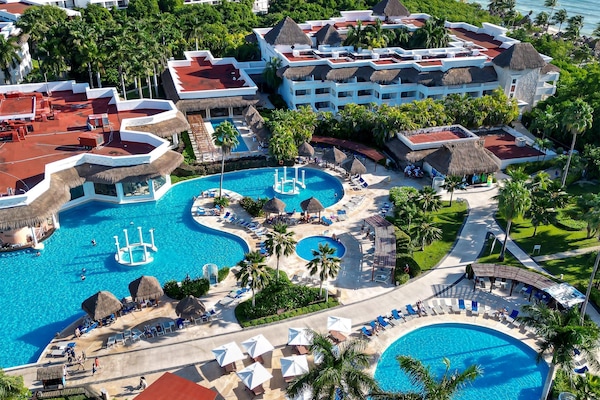 Indoor pool, 12 outdoor pools, open 8:00 AM to 8:00 PM, free cabanas