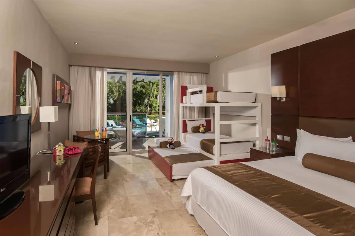 Family Club Room - Pool Access, Pool View | Free minibar, in-room safe, desk, blackout drapes