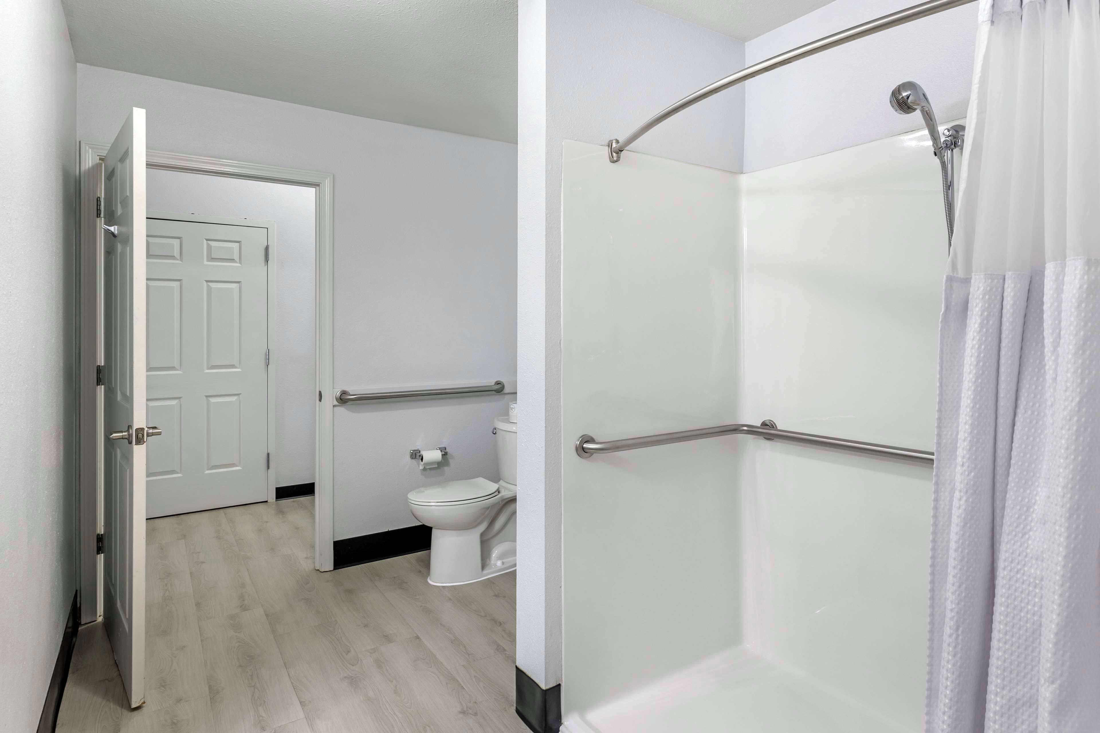 suite, 1 king bed, accessible, refrigerator & microwave (walk-in shower;with sofabed) | bathroom | free toiletries, hair dryer, towels, soap