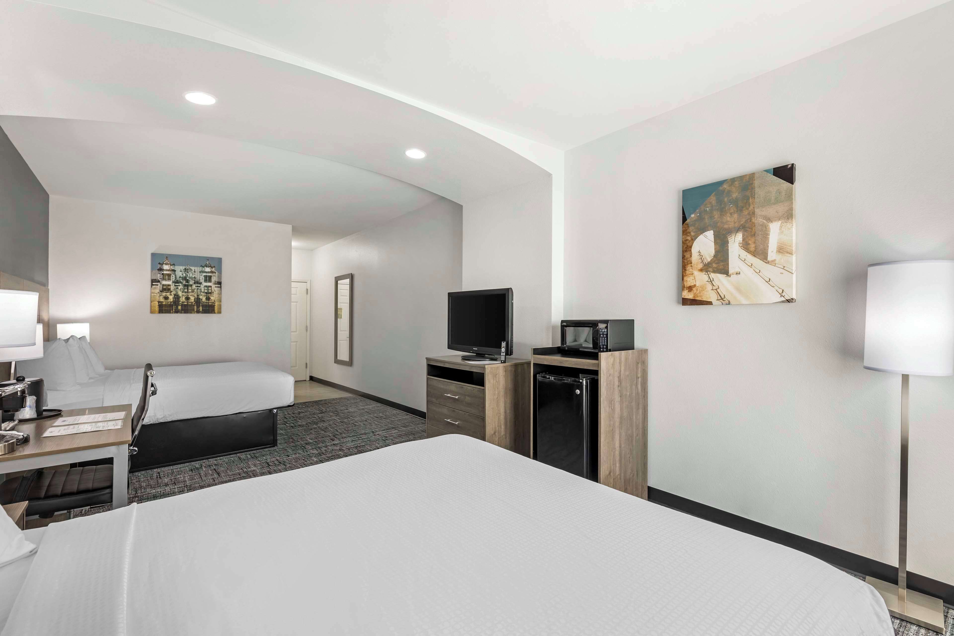 standard room, 2 queen beds, non smoking, refrigerator & microwave (larger room) | pillow-top beds, desk, laptop workspace, blackout curtains