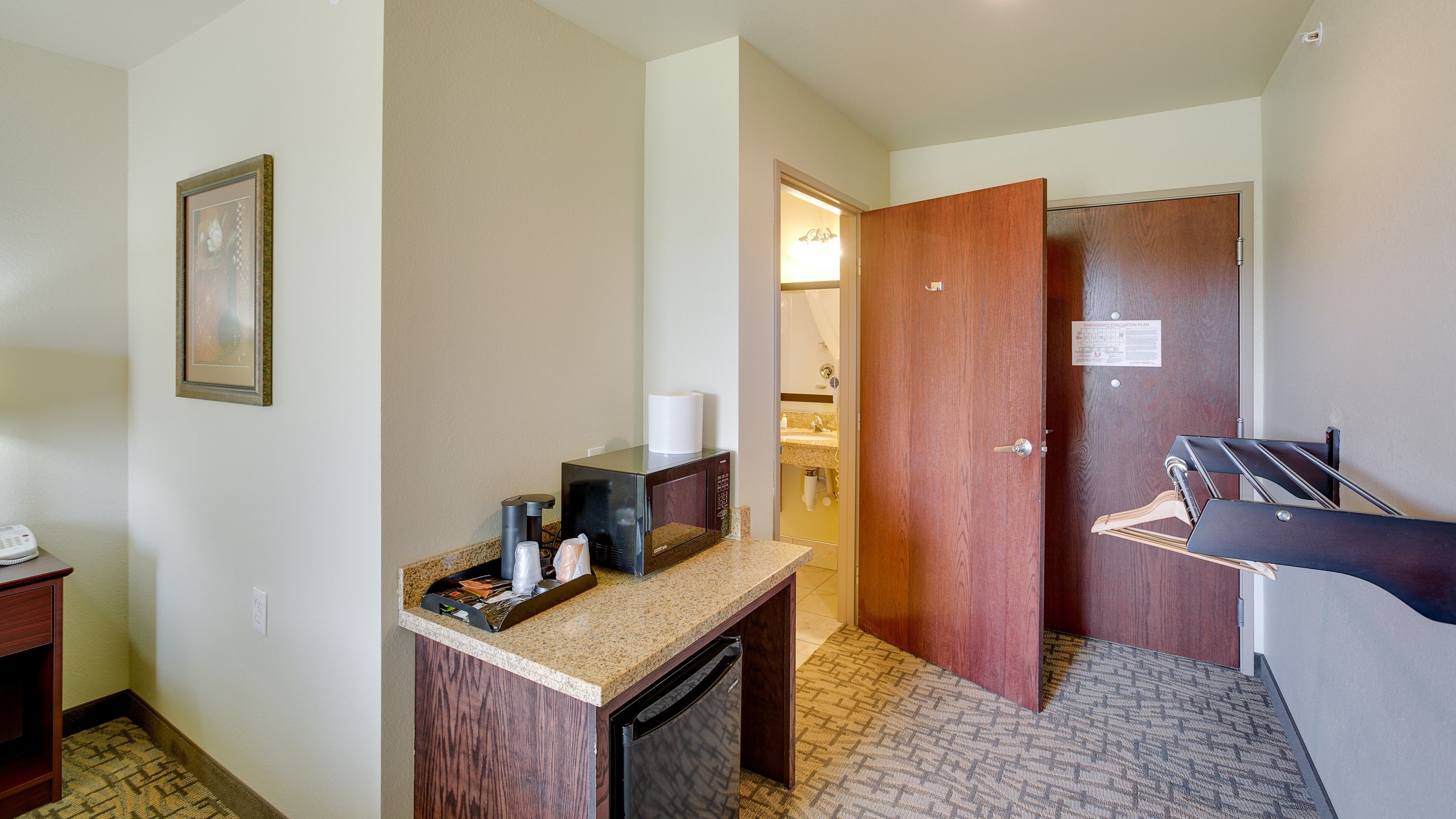 desk, laptop workspace, blackout curtains, iron/ironing board