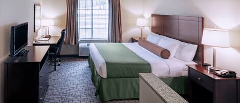 Suite, 1 King Bed, Non Smoking | Desk, laptop workspace, blackout drapes, iron/ironing board