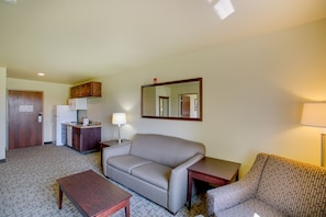 Queen Handicap Accessible Extended-Stay Suite with Pull-out Sofa | Desk, laptop workspace, blackout drapes, iron/ironing board - Cobblestone Inn & Suites - Durand (Durand)