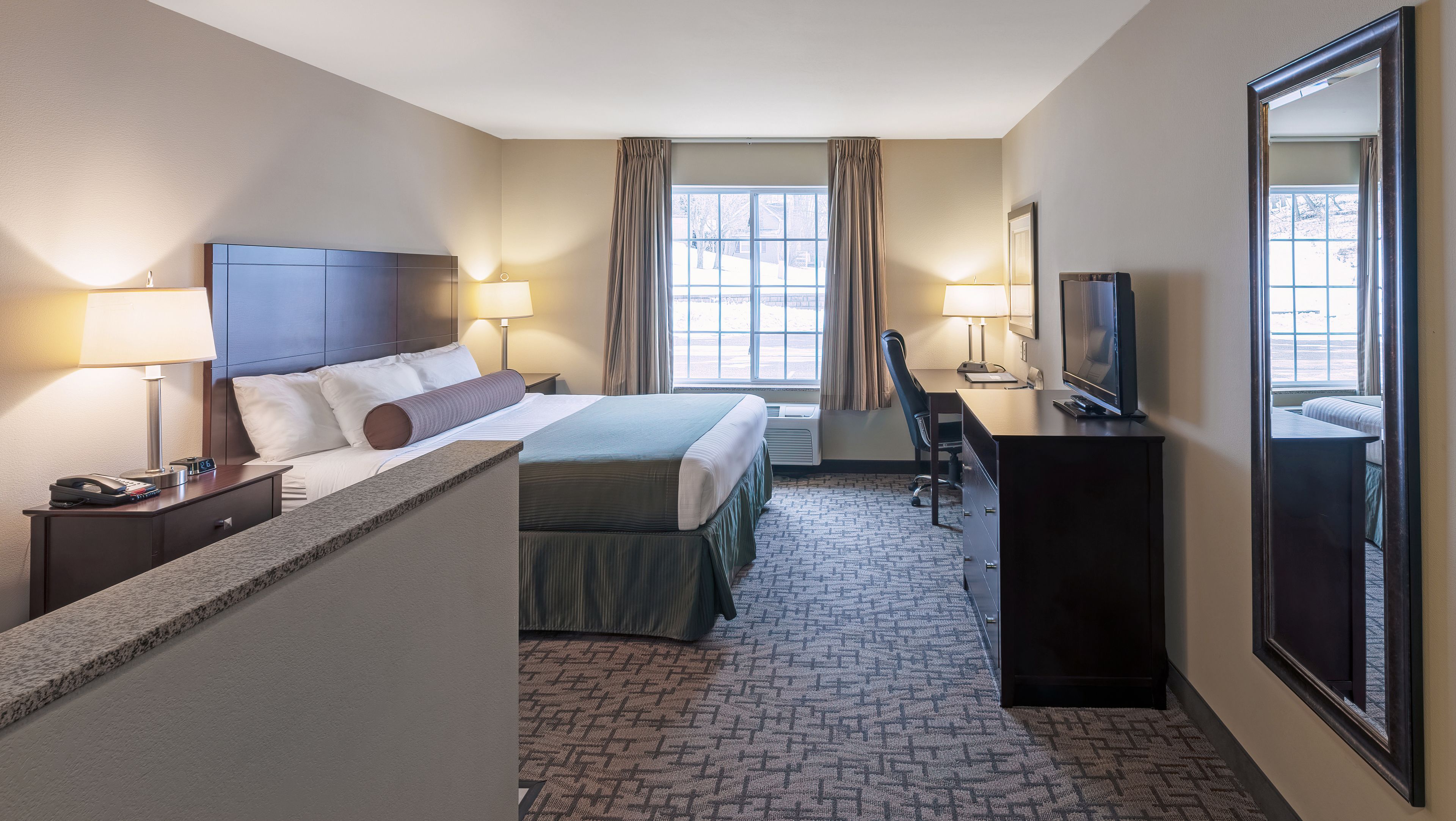 suite, 1 king bed, non smoking | desk, laptop workspace, blackout curtains, iron/ironing board