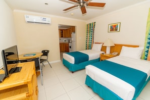 Studio with 2 Twin Beds | 1 bedroom, blackout drapes, iron/ironing board, free cribs/infant beds
