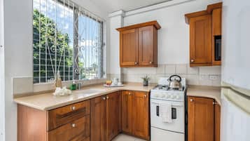 Standard Room, 2 Bedrooms | Private kitchen | Coffee/tea maker, fridge, microwave, stovetop