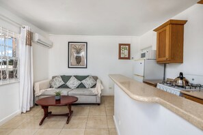 Standard Studio | Living area | LCD TV - Adulo Apartments (Rockley)