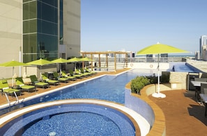Outdoor pool, pool umbrellas, pool loungers