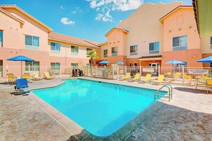 Outdoor pool, open 8:00 AM to 11:00 PM, pool umbrellas, sun loungers