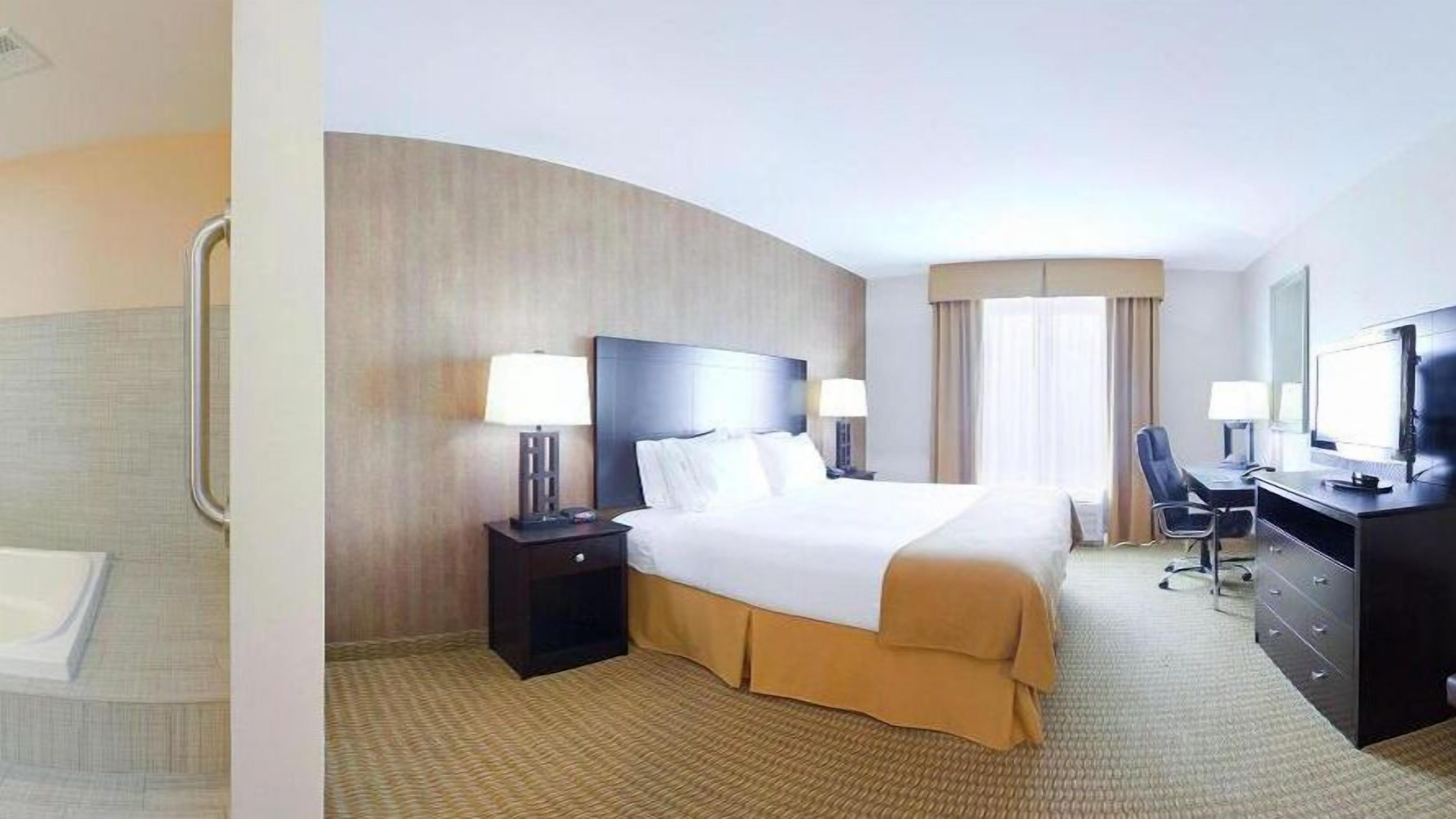 desk, blackout curtains, iron/ironing board, free cots/infant beds