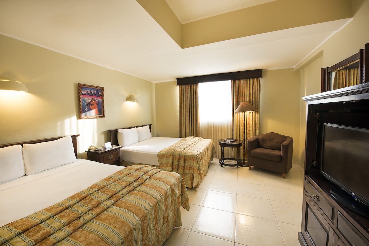 Premium bedding, down comforters, pillowtop beds, minibar