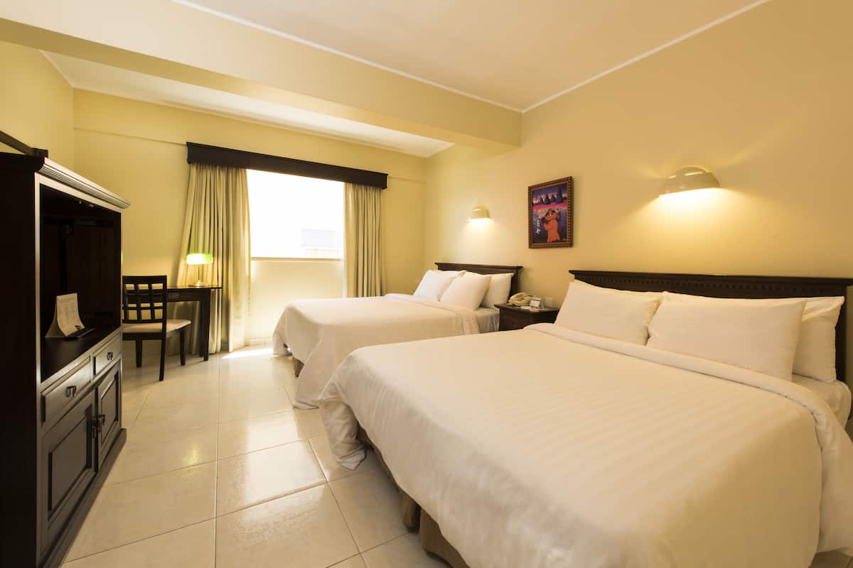 Premium bedding, down comforters, pillowtop beds, minibar