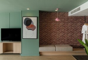 Suite boutique | Minibar, coffre-fort, rideaux dâobscurcissement