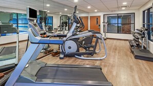 A gym with various exercise equipment including treadmills, elliptical machines, and dumbbells. - Holiday Inn Express Picayune-Stennis Space Center by IHG (Picayune)