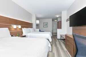 In-room safe, desk, iron/ironing board, cribs (free)