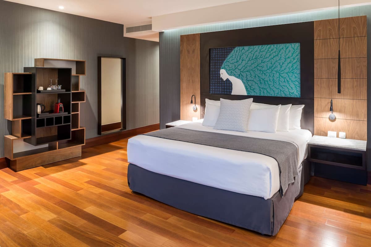 Down duvets, pillow-top beds, minibar, in-room safe