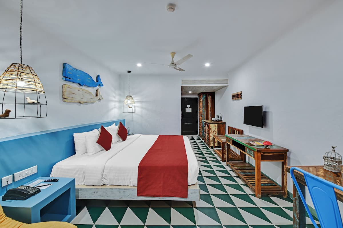 Luxe beddengoed, donzen dekbedden, een minibar, een kluis op de kamer