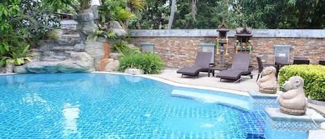 Outdoor pool, pool umbrellas, sun loungers