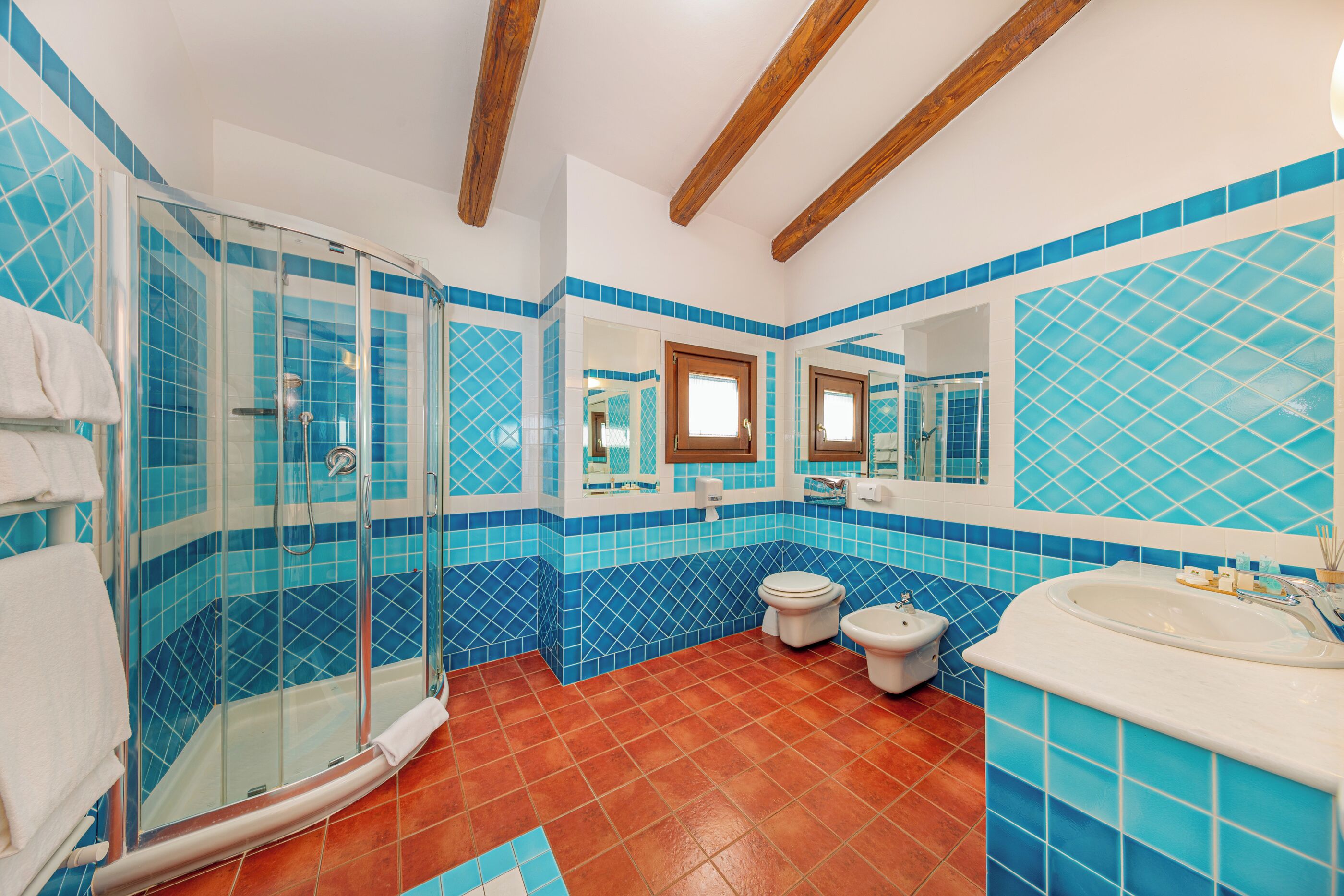 superior double room | bathroom | shower, rainfall showerhead, free toiletries, hair dryer