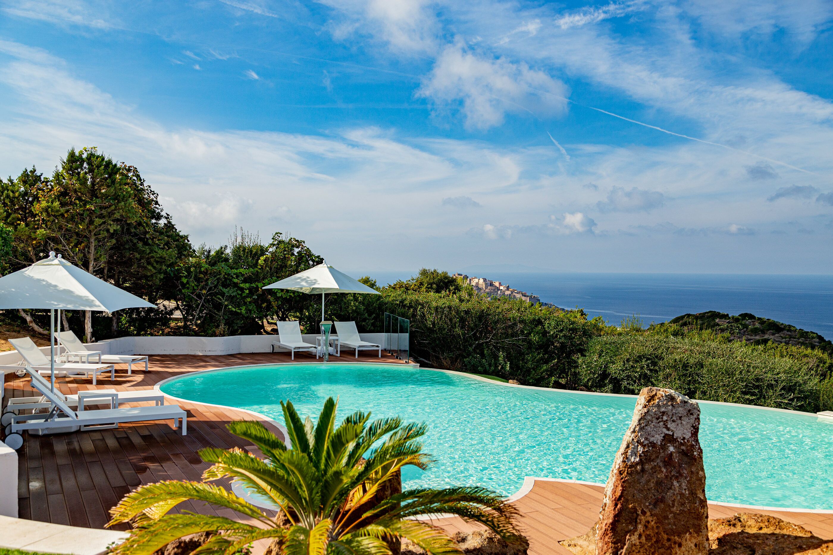 outdoor pool, open 8:30 am to 7:30 pm, pool umbrellas, pool loungers