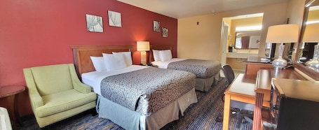 Deluxe Room, 2 Queen Beds, Non Smoking | Desk, laptop workspace, iron/ironing board, free WiFi. Olympic Inn & Suites