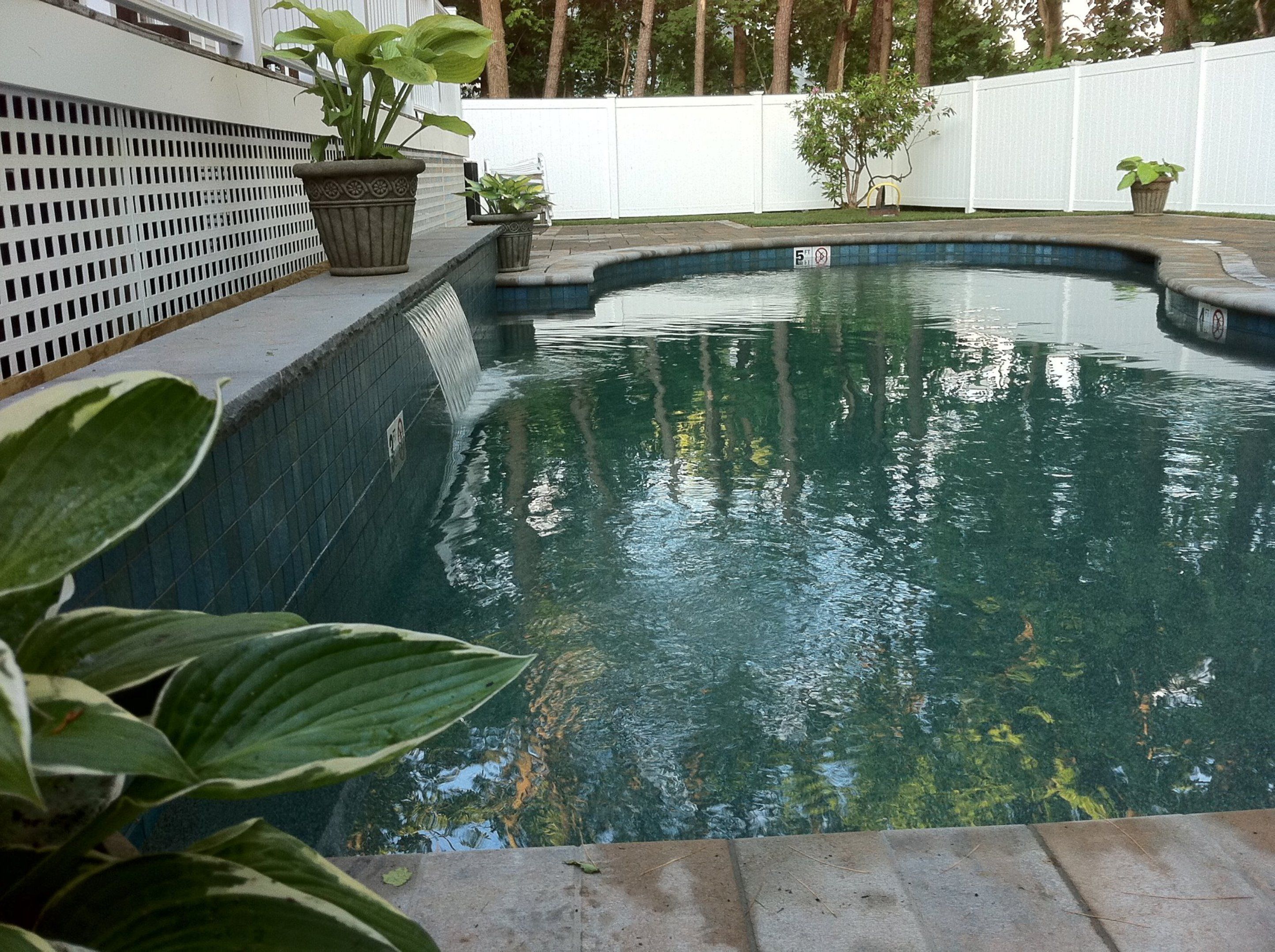 outdoor pool, open 9:00 am to 9:00 pm, pool loungers