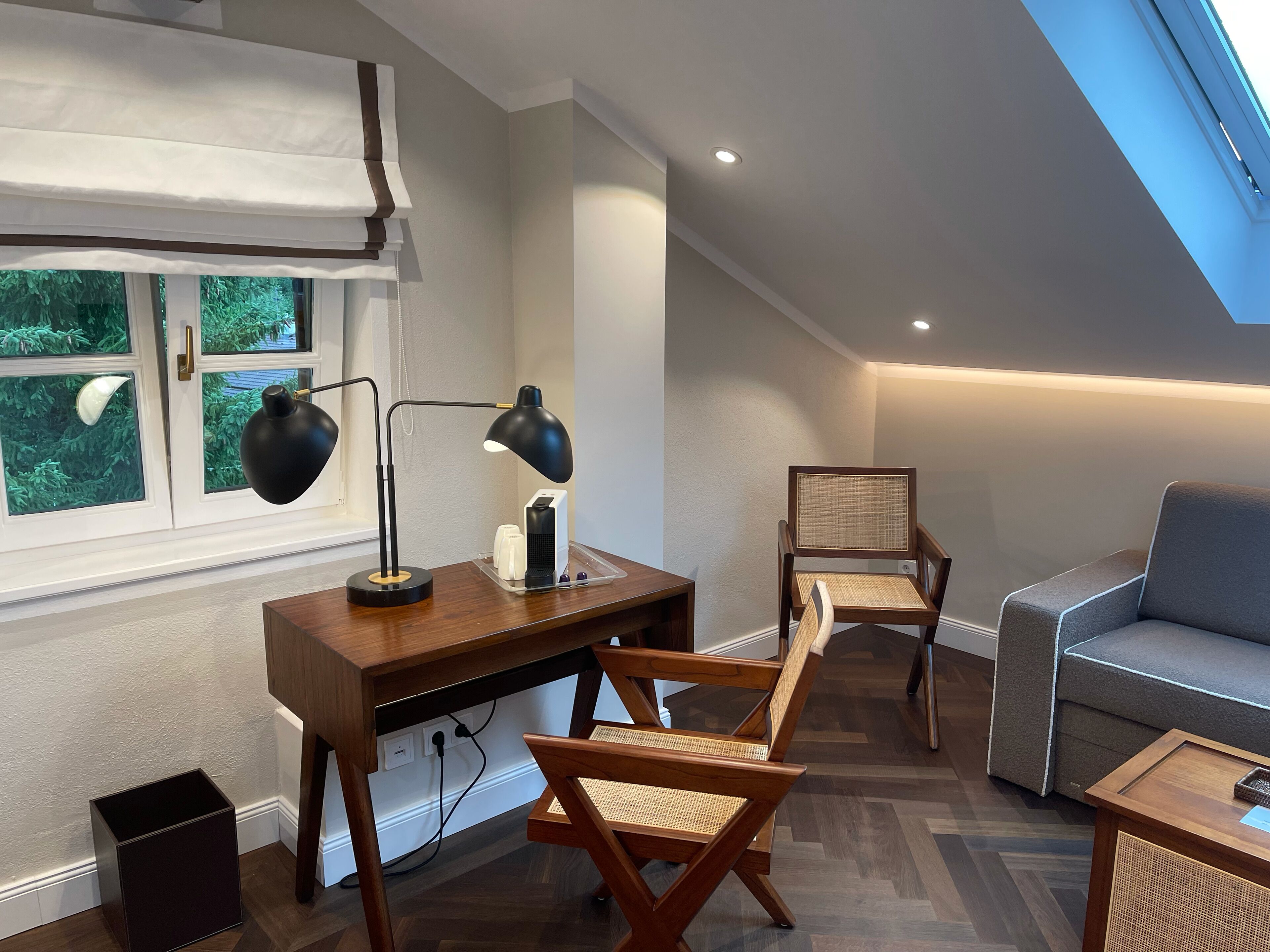 premium double room | living area | flat-screen tv